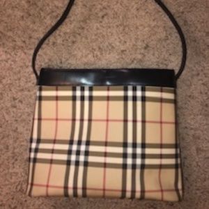 Burberry Vintage Check Leather Purse: $450